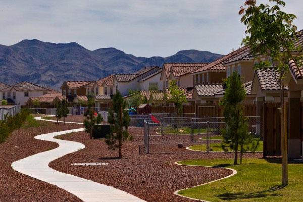 Walkway Behind Line Of Community Houses