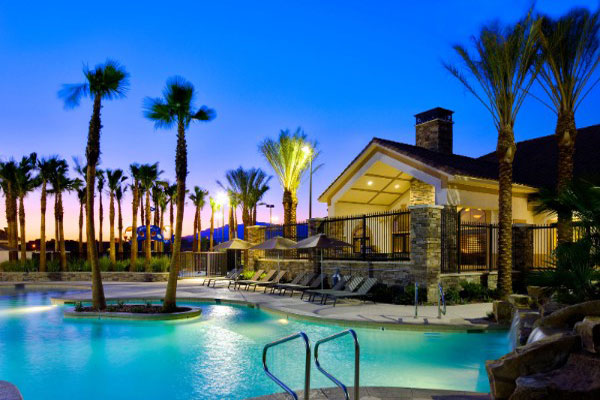 Community Pool Lit Up At Night